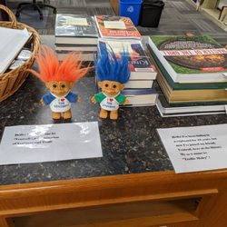 Ventress Memorial Library - Trolls on the check out desk made me smile