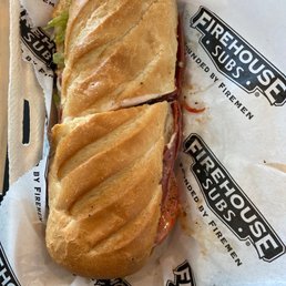 a sub sandwich in wrapper a sub sandwich in wrapper