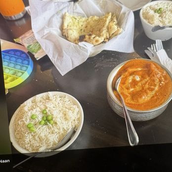 Saffron - South - Chicken Tikka Masala with Jasmine rice and garlic naan. - Indian Near Me - Austin, Texas Saffron - South - Chicken Tikka Masala with Jasmine rice and garlic naan. - Indian Near Me - Austin, Texas