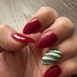 Second finger peeled off top layer and design.