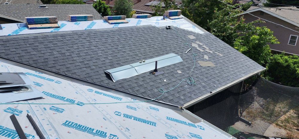 Slide of Julio & Family Roofing