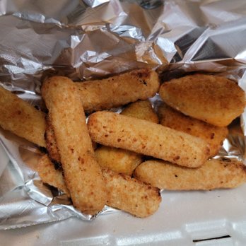 New York Pizza & Plus - Sampler $8.99. Out of potato skins so got subbed moz sticks. From frozen so hard pass next time. - Pizza Near Me - Sacramento, California