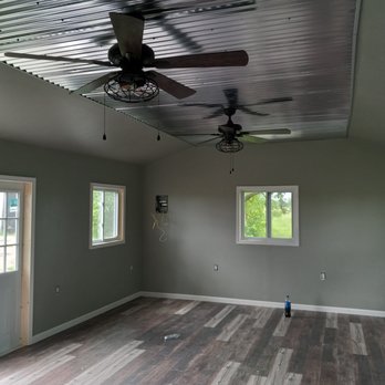Nathan Kalbfleisch Builders - a living room with a ceiling fan - General Contractors Near Me Nathan Kalbfleisch Builders - a living room with a ceiling fan - General Contractors Near Me