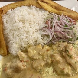 $20 Encocado de Pescado-- tender whitefish in awesome aji pepper-coconut sauce.