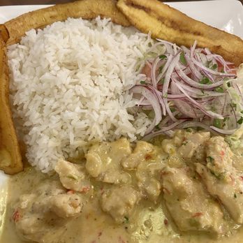 Como en Casa - $20 Encocado de Pescado-- tender whitefish in awesome aji pepper-coconut sauce. - Peruvian Near Me - Taylorsville, Utah