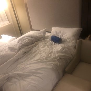 Hilton Anchorage - Chair shoved in front of bedside to fit rollaway. Room tiny! - Hotels Near Me - Anchorage, Alaska Hilton Anchorage - Chair shoved in front of bedside to fit rollaway. Room tiny! - Hotels Near Me - Anchorage, Alaska