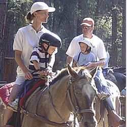 Icicle Outfitter & Guides - Youth wear helmets; adults are encouraged to.
Guided trail rides of 2 and 4 miles, half day and fun day rides.
