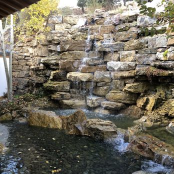 izanami - Beautiful rocky landscaped water display on the path as you enter Izanami - Tapas/Small Plates Near Me - Santa Fe, New Mexico