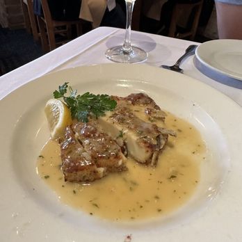 Fandango Restaurant - $15 calamari appetizer has a good sauce, thick pieces, with a good bite - French Near Me - Pacific Grove, California Fandango Restaurant - $15 calamari appetizer has a good sauce, thick pieces, with a good bite - French Near Me - Pacific Grove, California