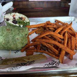 Chicken Berry Pecan Wrap and sweet potato fries. Chicken Berry Pecan Wrap and sweet potato fries.