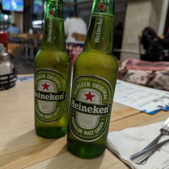 Mea Inu Beach Bar & Grill - two bottles of heineken beer - American Near Me - Lihue, Hawaii