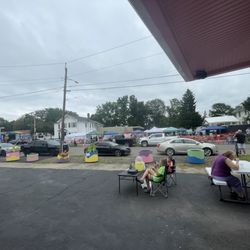 The Lilly Pad Ice Cream Shop - Seating outside with lemonade stand