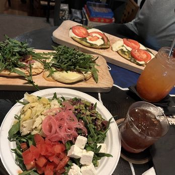 Roots Public Social Club - fig and prosciutto flatbread, salad, pesto flatbread - Beer Bar Near Me - Oneonta, New York Roots Public Social Club - fig and prosciutto flatbread, salad, pesto flatbread - Beer Bar Near Me - Oneonta, New York