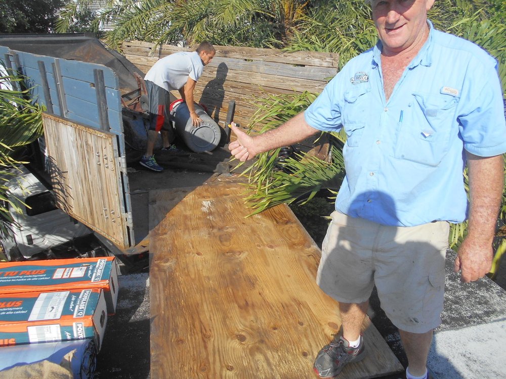 Slide of J K Behan Roofing