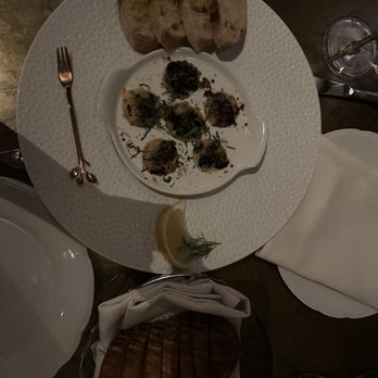 Le Basque - Escargot with baguette and sourdough on right (came with a different appetizer) - Vegan Near Me - New York, New York