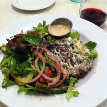 The Counter - Burger topped with bleu cheese among the organic greens - Burgers Near Me - Honolulu, Hawaii