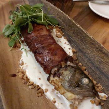 Martina - stuffed whole trout $32 Not the most appetizing dish, but it was delicious and so filling!  No bones! - Argentine Near Me - Minneapolis, Minnesota
