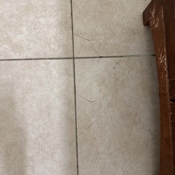 Invitation Homes - Cracked tile after tub installed - Property Management Near Me - Glendale, California Invitation Homes - Cracked tile after tub installed - Property Management Near Me - Glendale, California