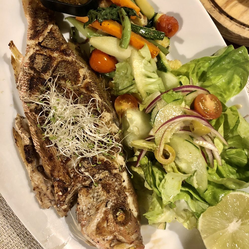 Restaurant Piedra Escondida - Whole fresh fish of day, red snapper. Was perfectly cooked and delicious! Came with a garlic butter sauce. - Seafood Near Me - Tulum, ROO Restaurant Piedra Escondida - Whole fresh fish of day, red snapper. Was perfectly cooked and delicious! Came with a garlic butter sauce. - Seafood Near Me - Tulum, ROO