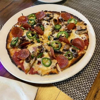 Ruffino's On The River - Cauliflower supreme pizza with jalapeños added - Seafood Near Me - Lafayette, Louisiana Ruffino's On The River - Cauliflower supreme pizza with jalapeños added - Seafood Near Me - Lafayette, Louisiana