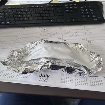 Monchy's - Wrapping keeps it hot and has a liner to soak up any spills - Mexican Near Me - Houston, Texas