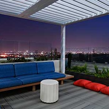 Outdoor Elements - High-rise patio with pergola - Landscaping Near Me - Houston, Texas Outdoor Elements - High-rise patio with pergola - Landscaping Near Me - Houston, Texas