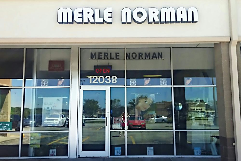 Merle Norman Cosmetics Studio Logo