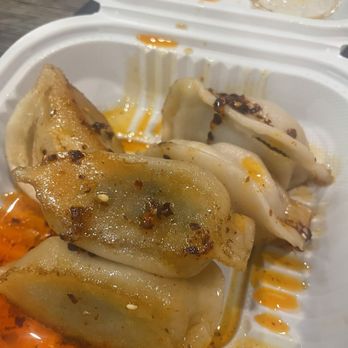 Vanessa's Dumpling House - Pork and 01. Chive and Pork Dumplings with chili oil - Chinese Near Me - New York, New York