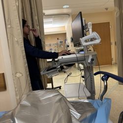 Mitchel Lee S MD - Watching my nurse in the pre-op room prior to surgery.