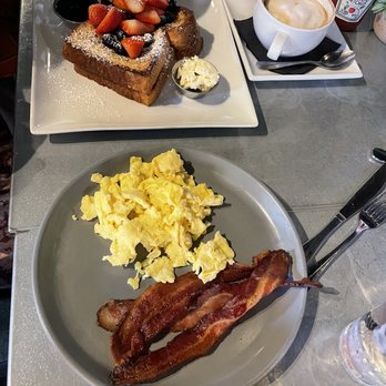 Toast - French toast with blueberry and strawberries. Scrambled eggs with bacon . - Breakfast & Brunch Near Me - Temecula, California Toast - French toast with blueberry and strawberries. Scrambled eggs with bacon . - Breakfast & Brunch Near Me - Temecula, California
