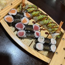 Tokyo Grill - Maki A and Green Dragon Roll on a boat :)