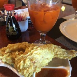 Thai Legacy Restaurant - Stuff Chicken Wings and Thai ice tea.