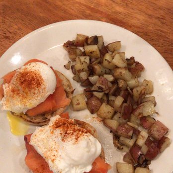 Meli Cafe - Benedicts Salmon-House cured Salmon, poached eggs, hollandaise sauce. - New American Near Me - Chicago, Illinois