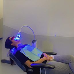 Lounging around while whitening my teeth