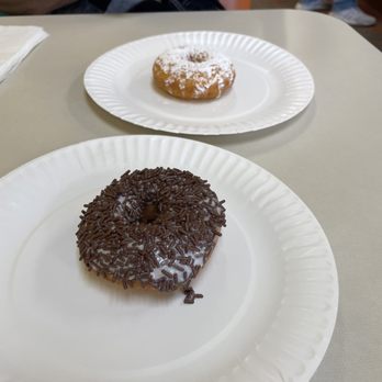 Desert Donuts - Black and White Donut with funnel cake donut of the month donut in background - Donuts Near Me - Phoenix, Arizona