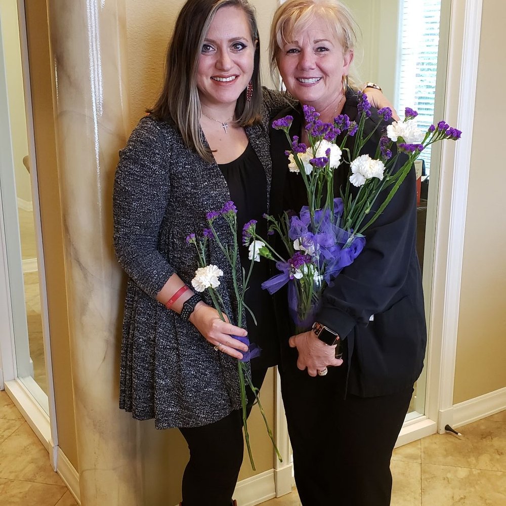 Tranquility Dental - My dental hygienist, Martha, and I with Mother's day flowers they are giving all mothers. - General Dentistry Near Me - McKinney, Texas Tranquility Dental - My dental hygienist, Martha, and I with Mother's day flowers they are giving all mothers. - General Dentistry Near Me - McKinney, Texas
