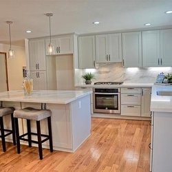Robert the Handyman - Complete kitchen remodel with large marble island by Robert and his team.