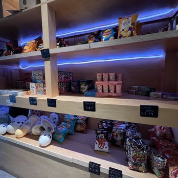 Taichi Bubble Tea - a shelf full of snacks - Poke Near Me - Ithaca, New York Taichi Bubble Tea - a shelf full of snacks - Poke Near Me - Ithaca, New York