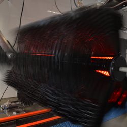 Our Top Wheel in motion featuring the bold orange glow of the Spin Light technology.