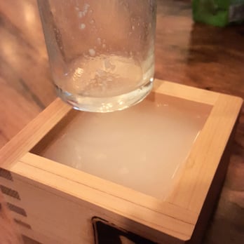 Uchi Dallas - $3 Happy hour nigori sake out of a wooden box? Uh....YEAH! - Japanese Near Me - Dallas, Texas Uchi Dallas - $3 Happy hour nigori sake out of a wooden box? Uh....YEAH! - Japanese Near Me - Dallas, Texas