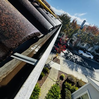 Alaska Solutions - After gutter cleaning - Window Washing Near Me