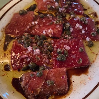 Tiny Champions - Raw tuna, capers, onions, and olive oil. - Pizza Near Me - Houston, Texas Tiny Champions - Raw tuna, capers, onions, and olive oil. - Pizza Near Me - Houston, Texas