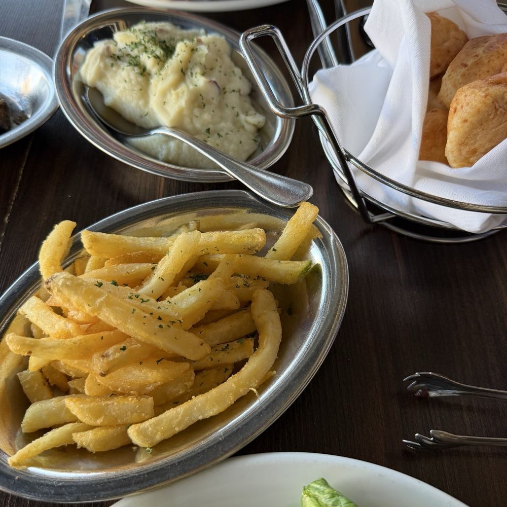 Mashed potatoes, French fries, plantains, and bread Mashed potatoes, French fries, plantains, and bread