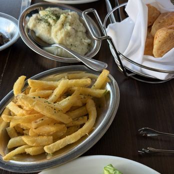Texas de Brazil - Rancho Cucamonga - Mashed potatoes, French fries, plantains, and bread - Brazilian Near Me - Rancho Cucamonga, California Texas de Brazil - Rancho Cucamonga - Mashed potatoes, French fries, plantains, and bread - Brazilian Near Me - Rancho Cucamonga, California