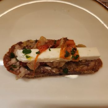 Plori Restaurant - Amuse Bouche Toasted Bread w/Feta and Herbs - Greek Near Me - Carle Place, New York
