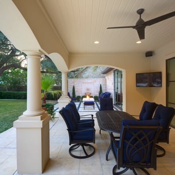 Perfect Lawns & Landworks - a patio with a table and chairs - Landscaping Near Me - Austin, Texas Perfect Lawns & Landworks - a patio with a table and chairs - Landscaping Near Me - Austin, Texas