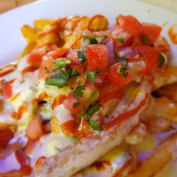 Ivar's River Pub - Bobcat fries..Get 'em with a drink with a river view - American Near Me - San Marcos, Texas Ivar's River Pub - Bobcat fries..Get 'em with a drink with a river view - American Near Me - San Marcos, Texas