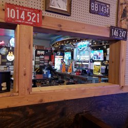 Southbank Original Barbecue - Bar framed from Rustic Dining area.