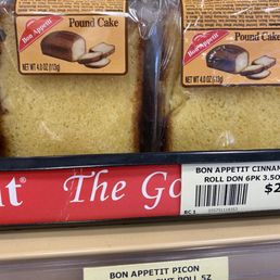 a display of pound cake in a grocery store