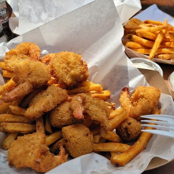 Shrimp N Stuff - 8 Fried shrimp with seasoned fries. - Seafood Near Me - Galveston, Texas Shrimp N Stuff - 8 Fried shrimp with seasoned fries. - Seafood Near Me - Galveston, Texas